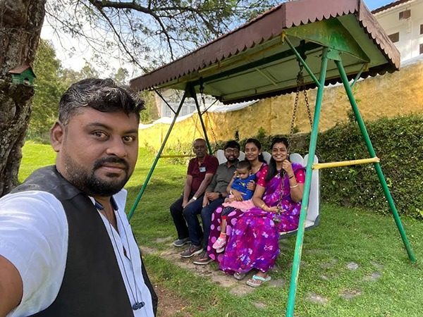 Family relaxing in a hill station garden – Best Travel Agency in Madurai