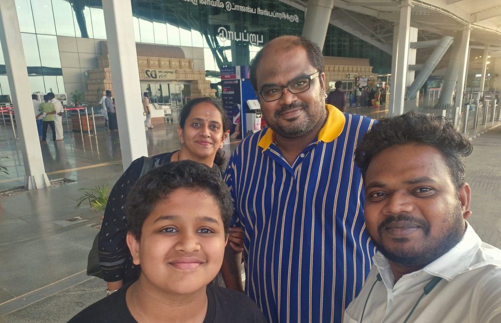 Family with South Moon driver at Madurai airport – Madurai Tour Packages