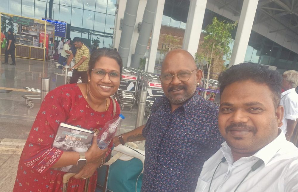 Guests with South Moon driver at Madurai airport – Tour and Travel Agency Near Me